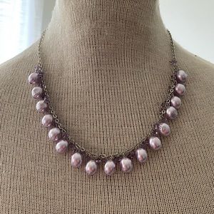 Beautiful dainty faux purple pearls and crystal beads.